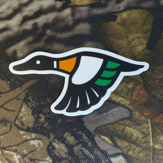 Logo sticker on camouflage fabric